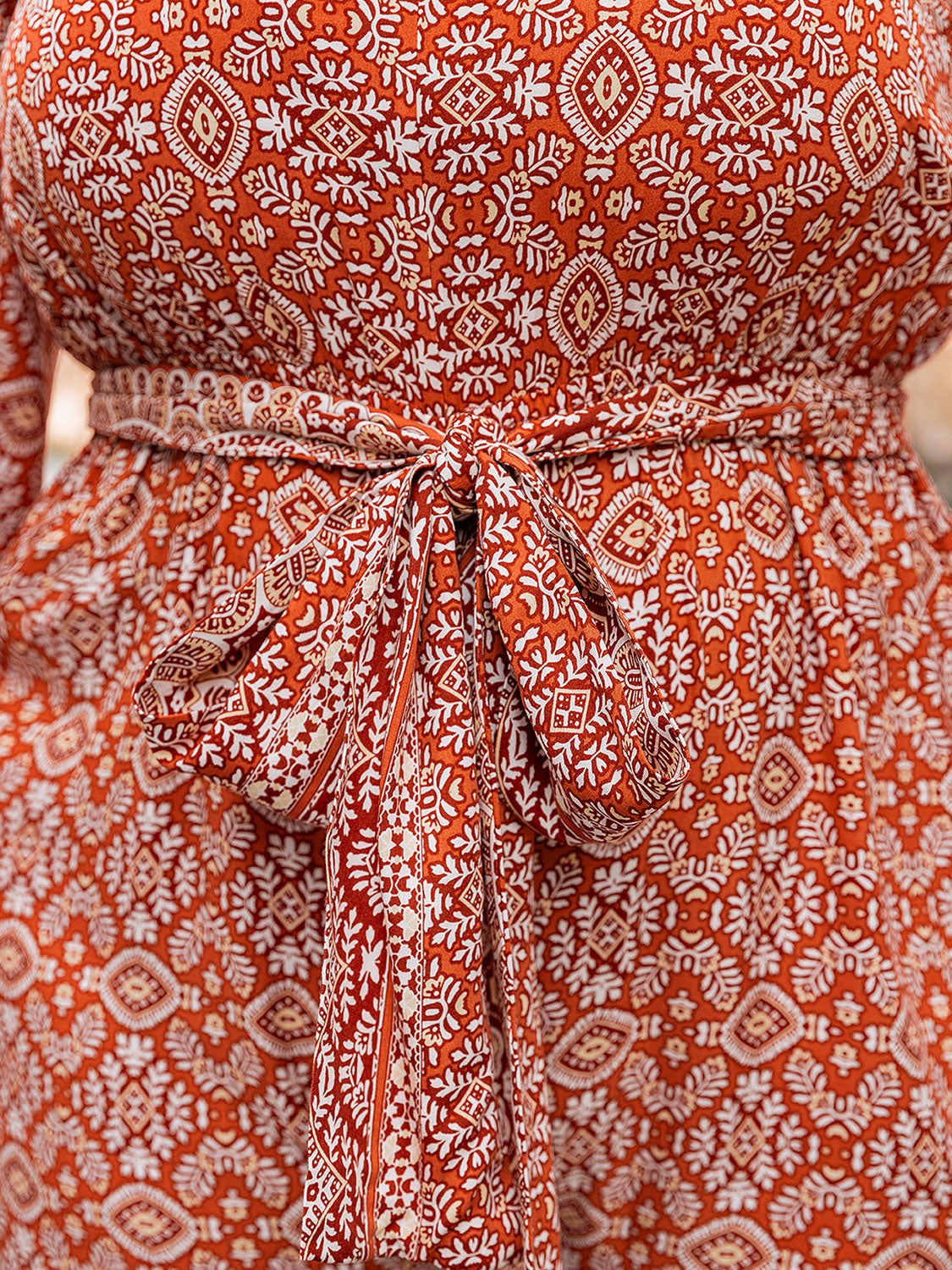 Plus Size Printed V-Neck Tie Front Balloon Sleeve Jumpsuit-Angel Casuals