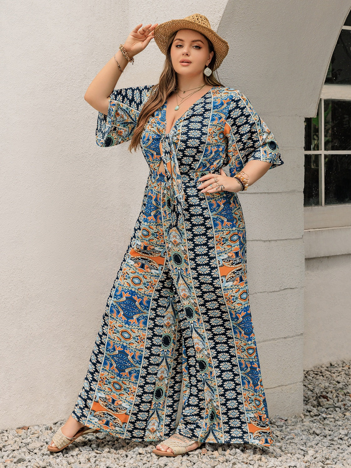 Plus Size Printed Half Sleeve Wide Leg Jumpsuit-Angel Casuals
