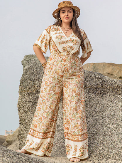 Plus Size V-Neck Flutter Sleeve Wide Leg Jumpsuit-Angel Casuals