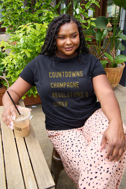 Simply Love Full Size COUNTDOWNS CHAMPAGNE RESOLUTIONS & CHEER Round Neck T-Shirt-Angel Casuals